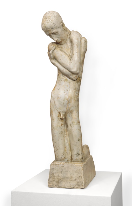 Kneeling youth